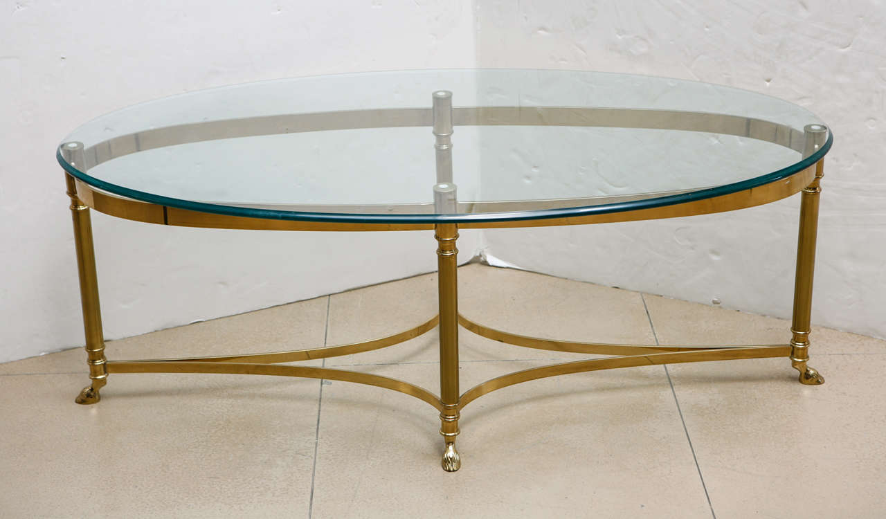 1960's Italian style Brass Hoof and glass oval coffee table