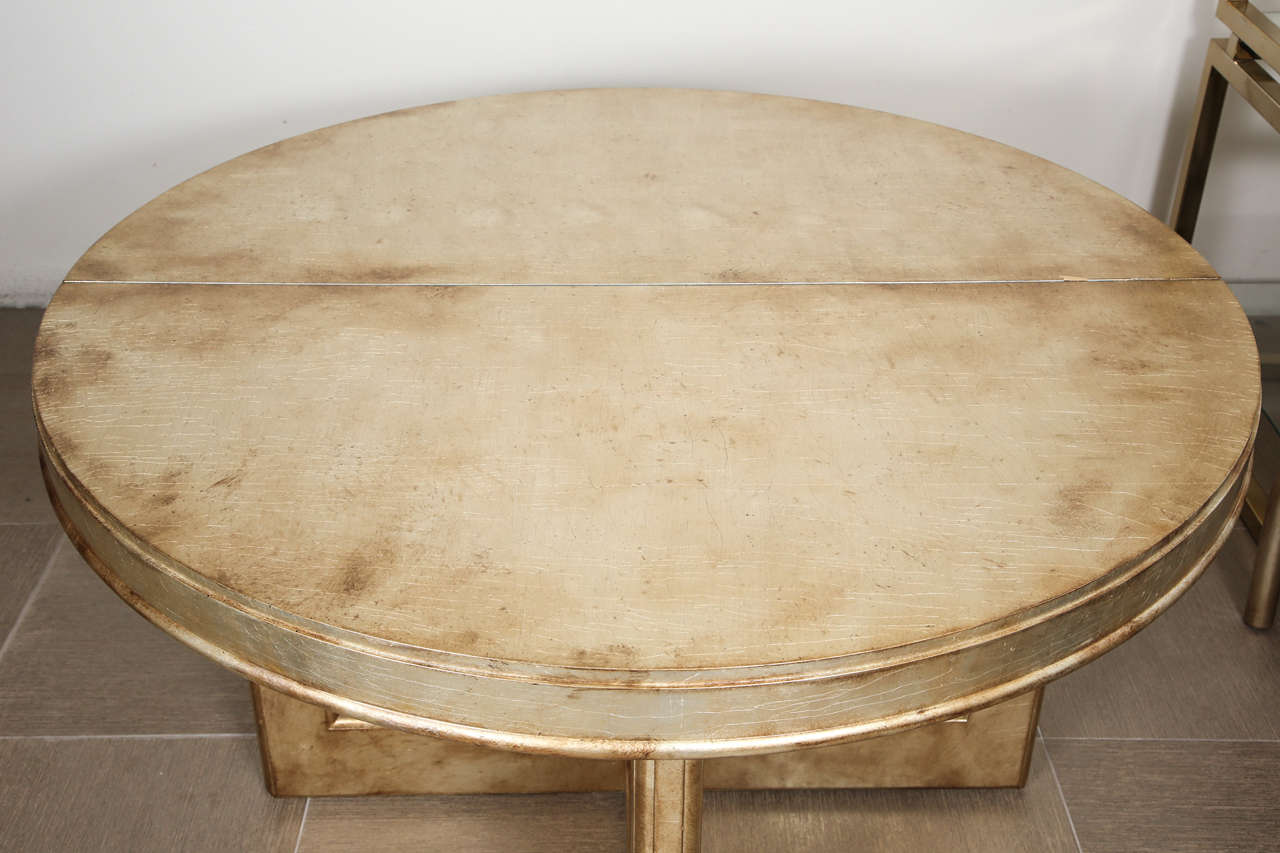 Round diining table with four chairs with pierced bamboo motif by James Mont In Good Condition In New York, NY