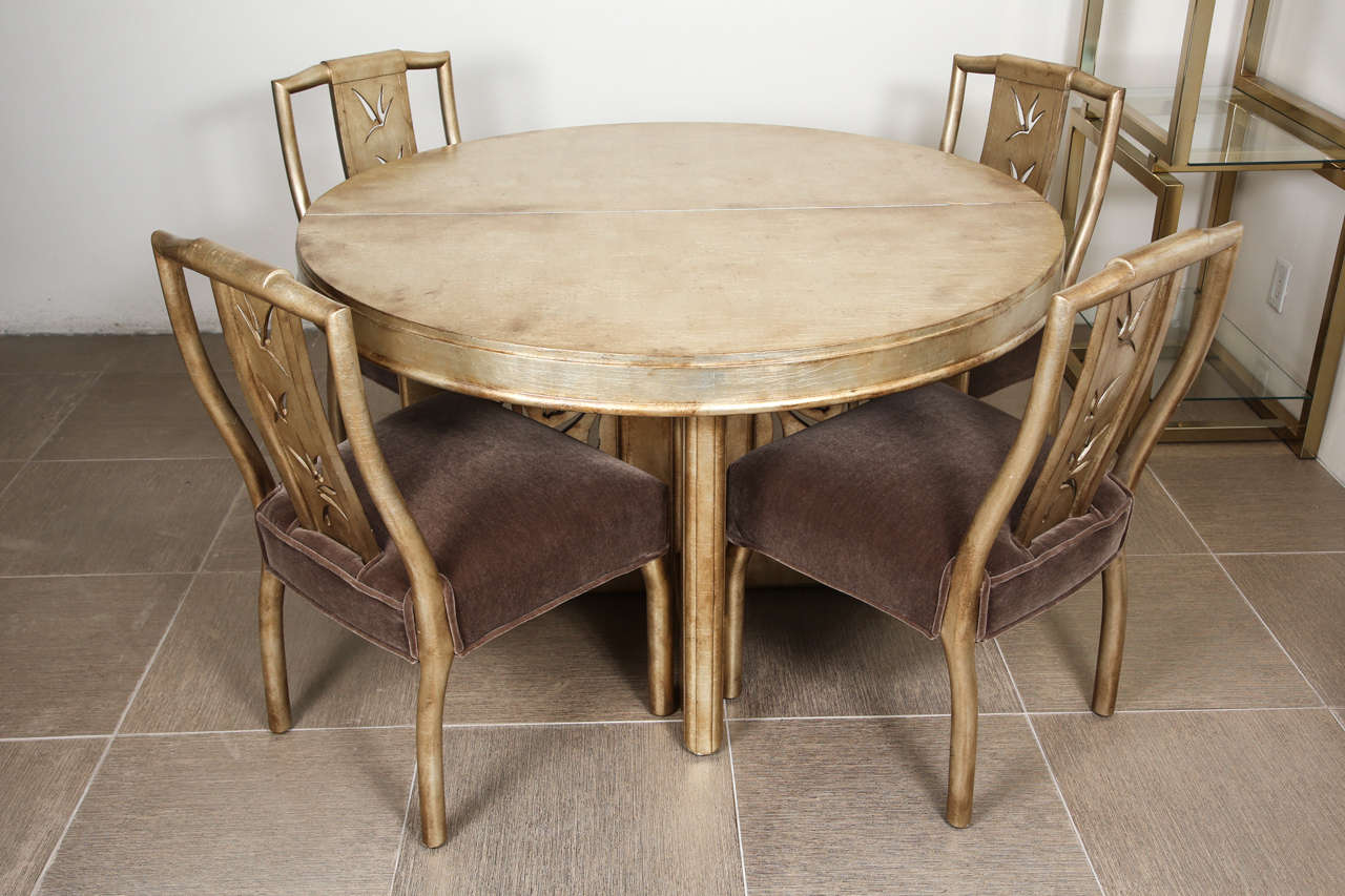 Round diining table with four chairs with pierced bamboo motif by James Mont 4