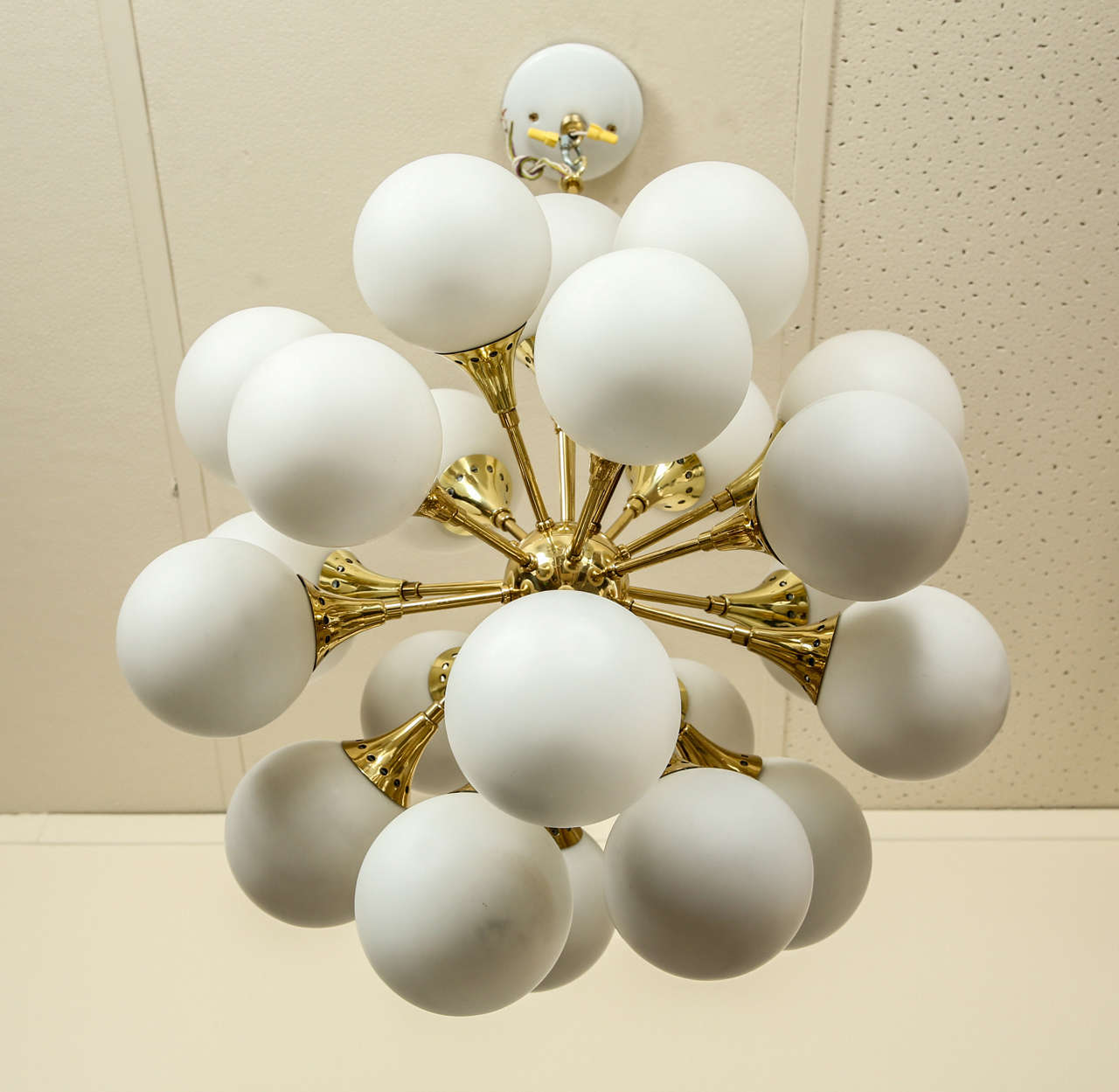 Fabulous brass sputnik chandelier with frosted glass globes. at 1stDibs
