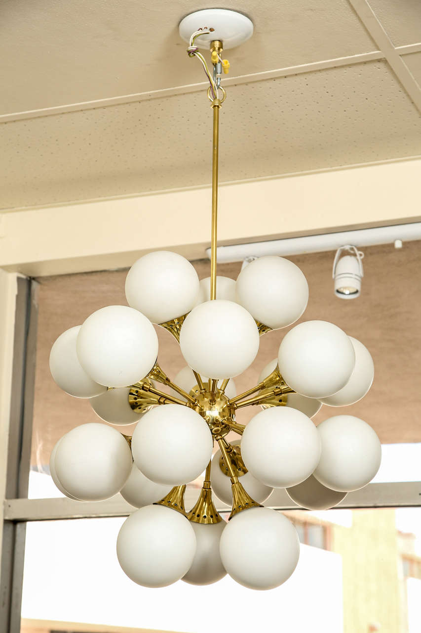 Fabulous brass sputnik chandelier with frosted glass globes. at 1stDibs