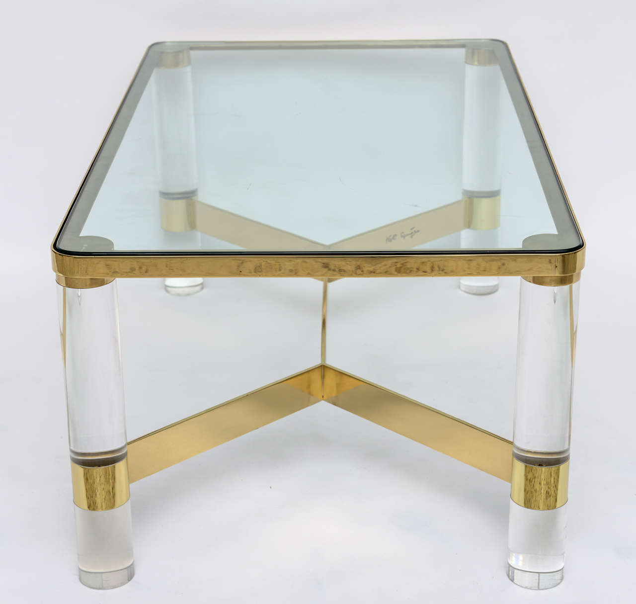Signed Karl Springer Lucite and Polished Bronze Coffee Table at 1stDibs