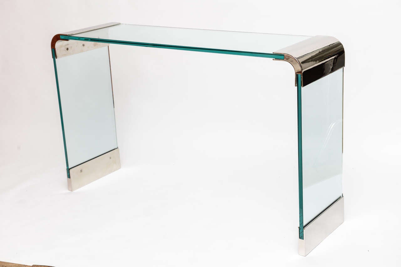 A Beautiful Pace  Collection waterfall console dating back to the 1970,s .  Polished nickel and glass all in excellent condition.