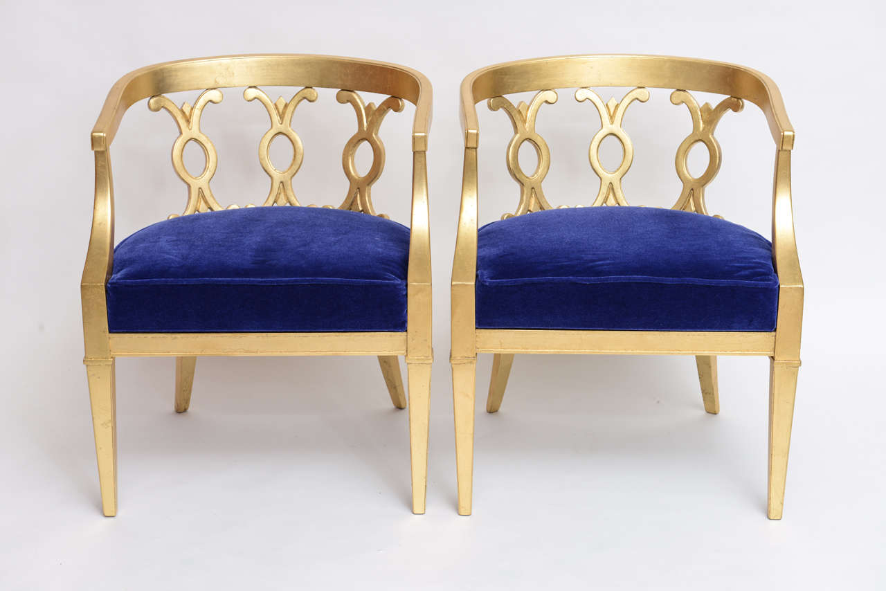 Beautiful pair of gold leafed MIDCENTURY chairs by Drexel . These chairs have been gold leafed and re-opholstered in a beautifull velvet fabric .