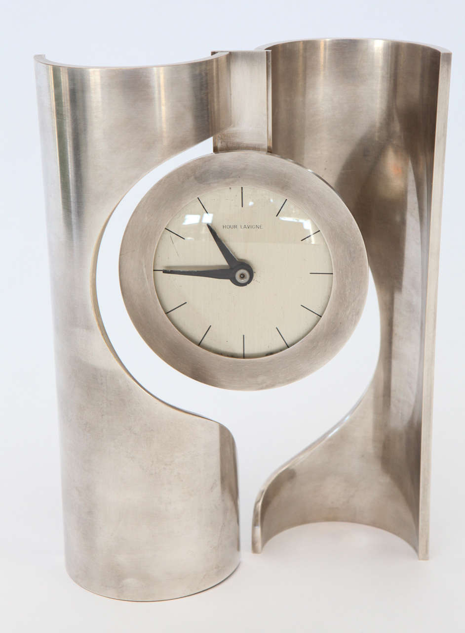 Most amazing and unusual chrome French Table Clock by Hour Lavigne, 1960s.

4.5 in diameter clock