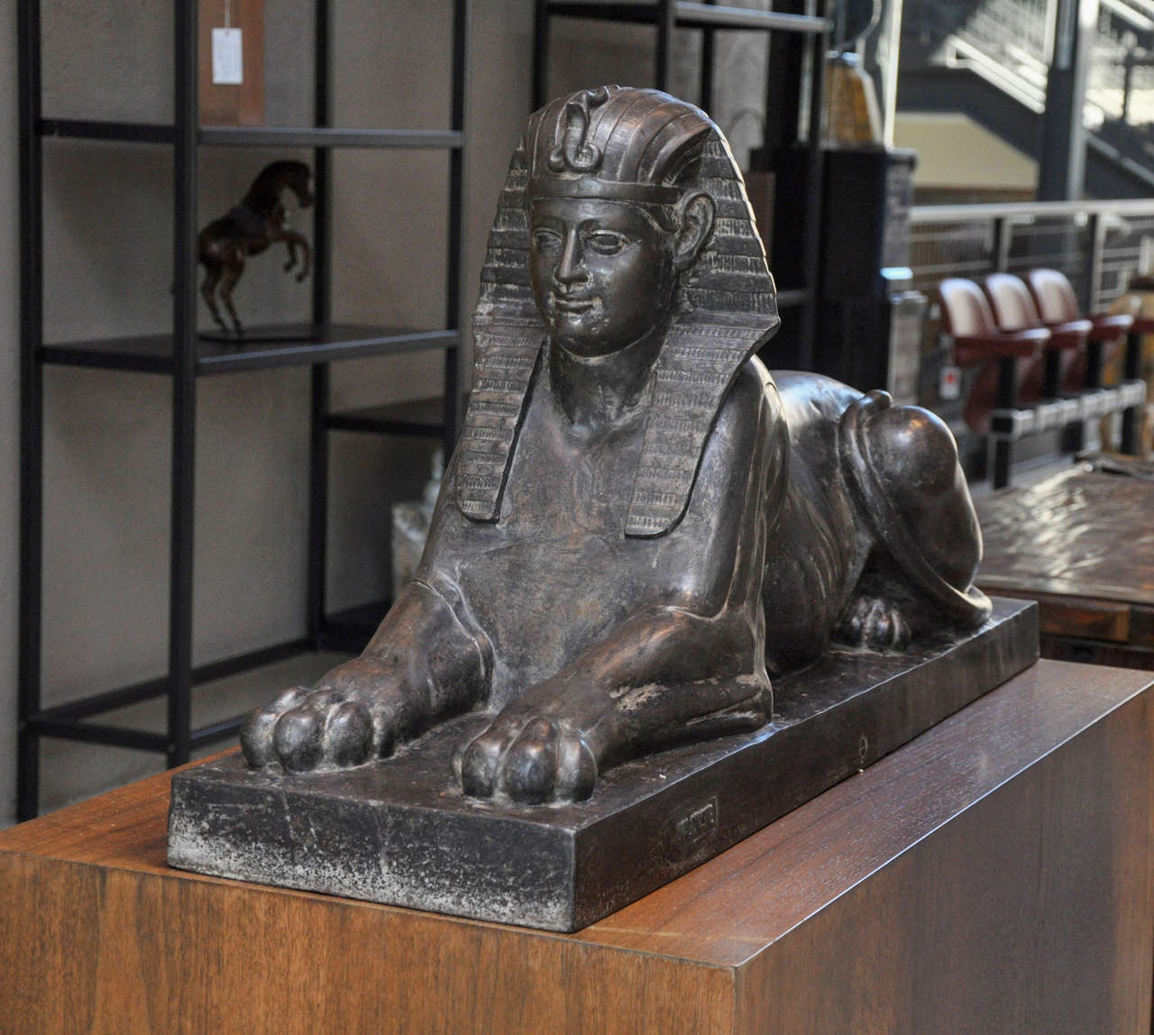 A beautifully cast late-19th century French iron Sphinx, with full Egyptian Pharoh headdress decorated with a cobra, cast at the Val D’Osne foundry. Mounted on custom pedestal.