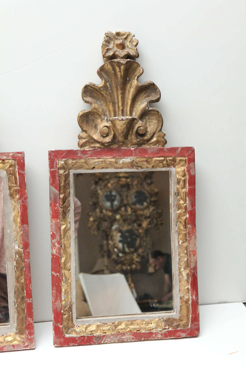 Pair of 18th C. hand carved mirrors with paint and gilt finish.  We believe these to be Italian, but cannot confirm. (Newer Mirrors)