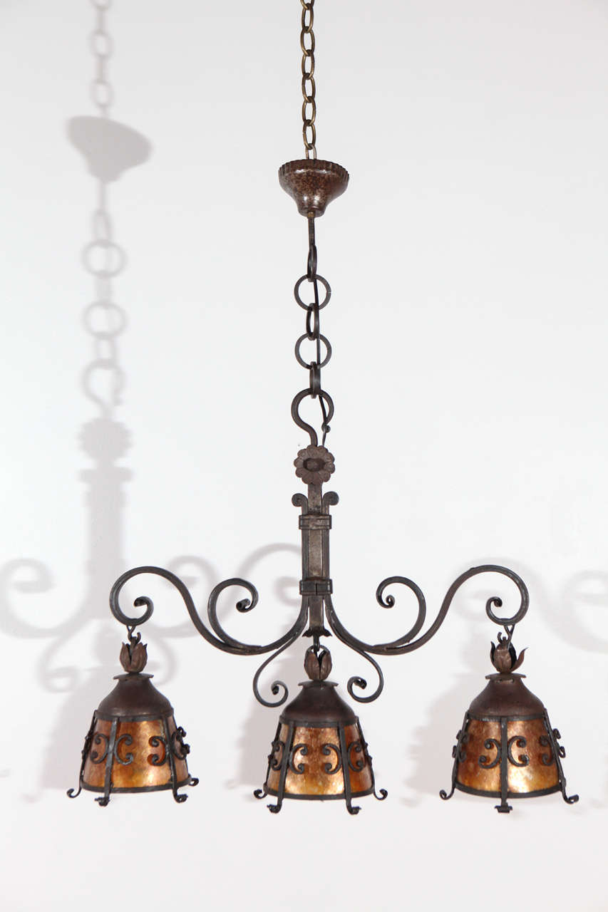 Beautifully detailed three-light French iron chandelier with new mica.