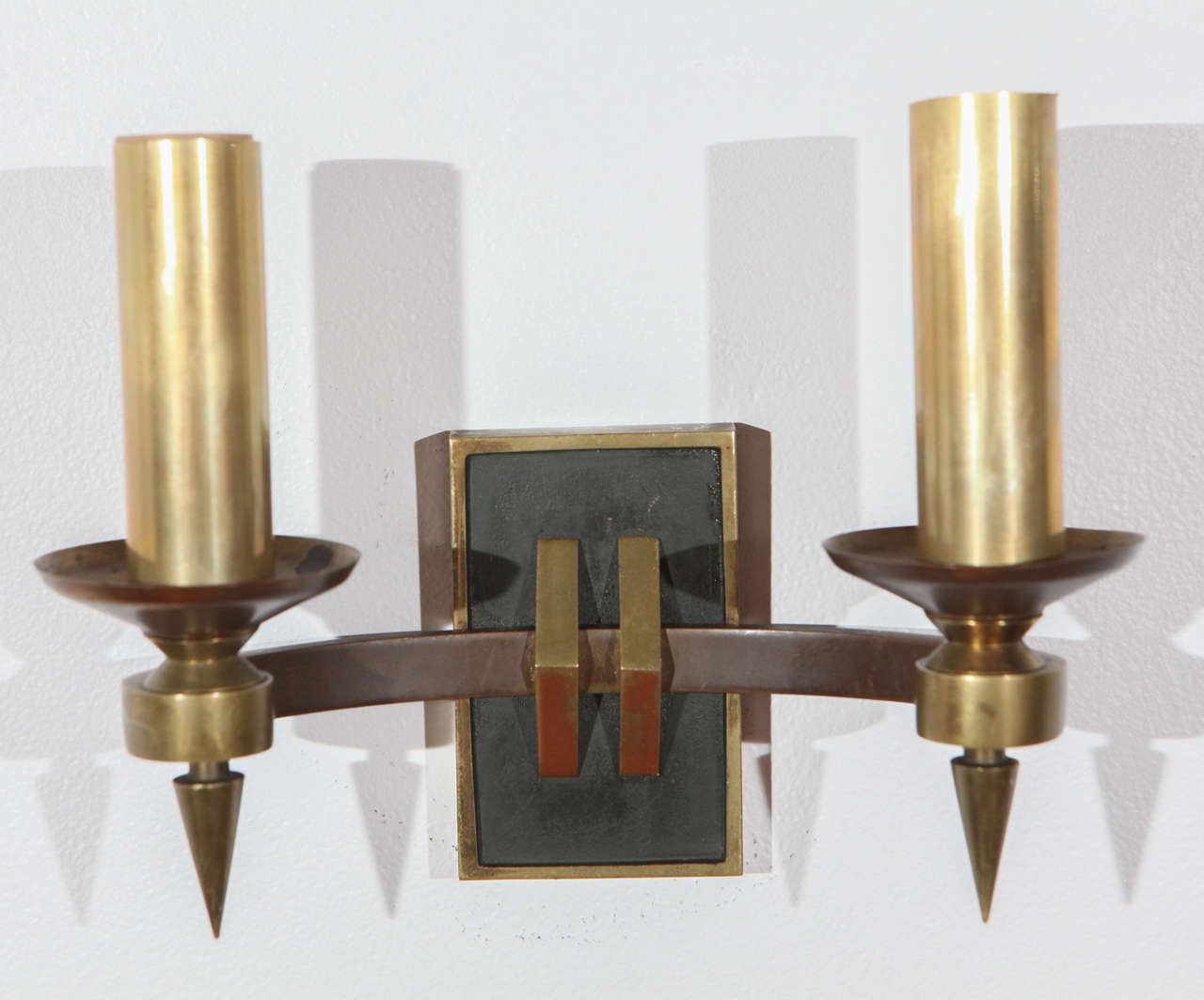 Pair of French brass sconces newly rewired for candelabra bulbs.