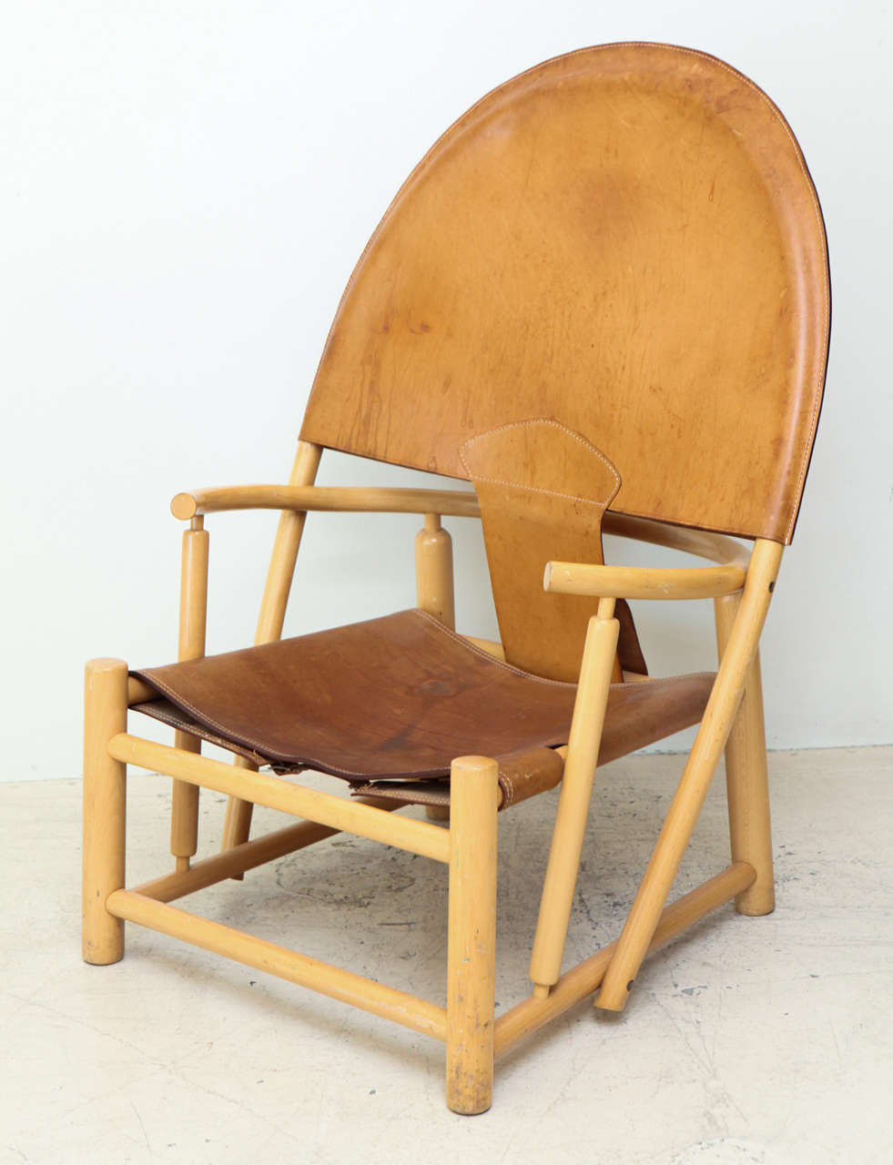 Rare leather and beech hoop chair by Borge Mogensen.  Denmark, circa 1950.