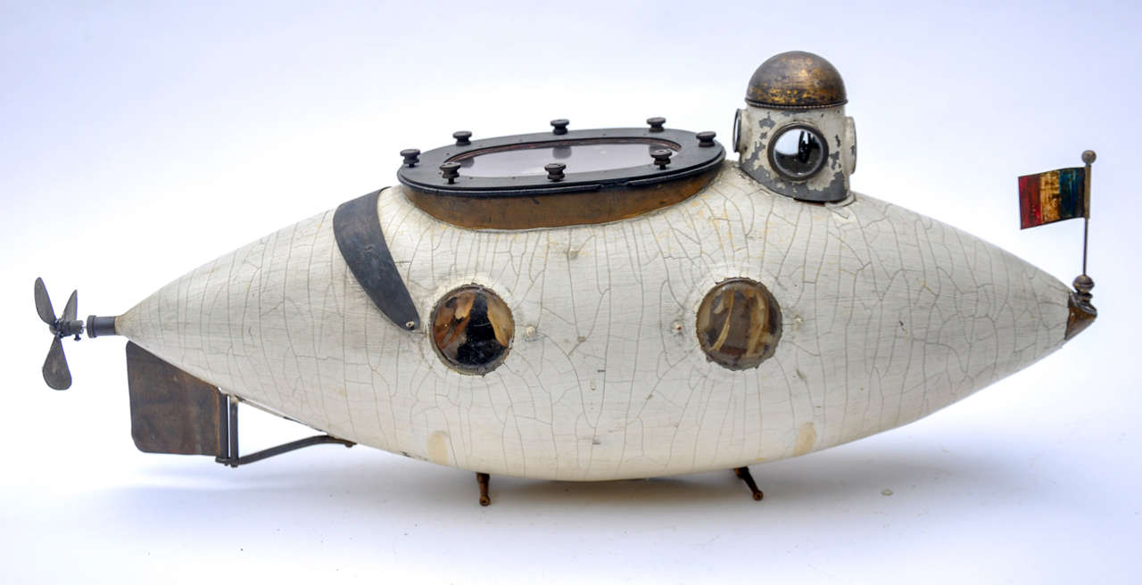 Jules Verne inspired Model of a Submarine, Early Twentith Century
Original Throughout, Bronze, Wood, Glass, and Mica. Electric Motor, One of a Kind. France, Circa 1900