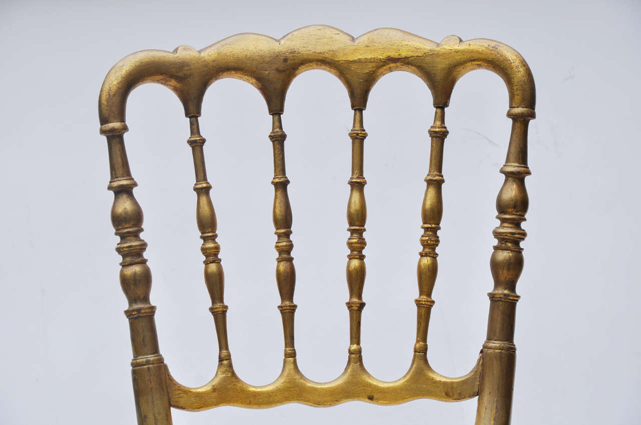 French Seven Cane-Seated Gilt Ballroom Chairs, France, circa 1890
