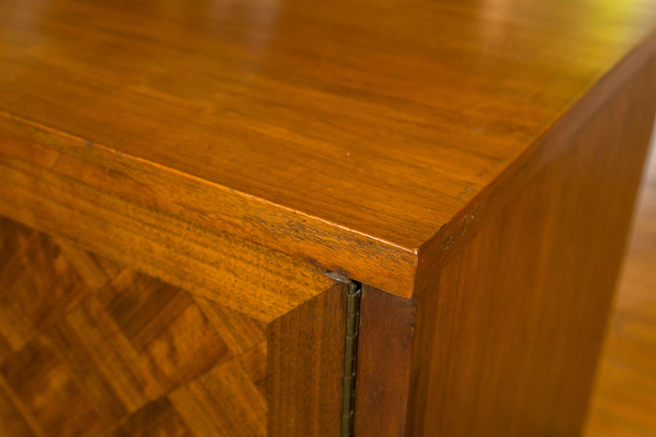 Pair of two-door marquetry and burled wood cabinets each with two pull-out drawers by Basic Witz. Two drawers in each, brass trim.