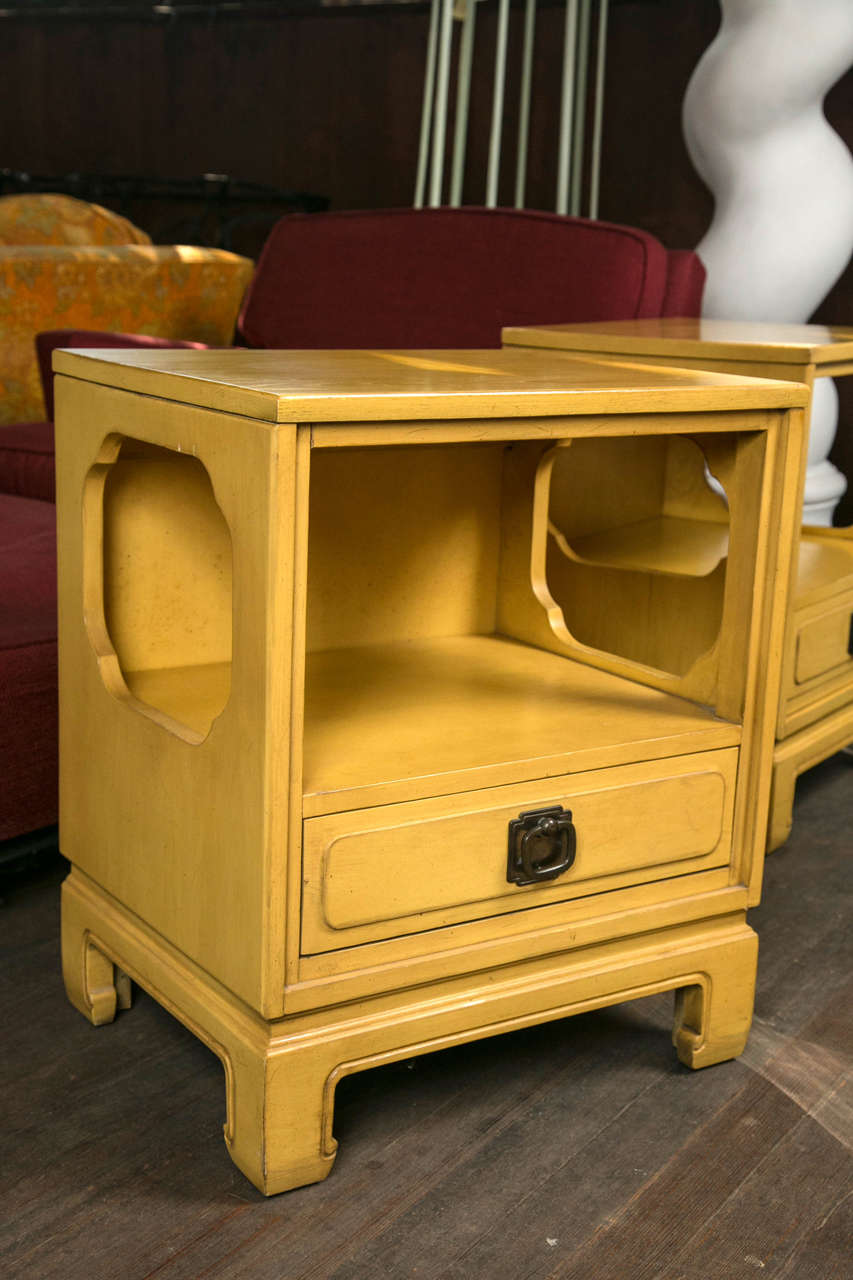 Solid wood nightstands or end tables with unfinished backs by Davis Cabinet Company in a original yellow stain finish. These are well made and of high quality.