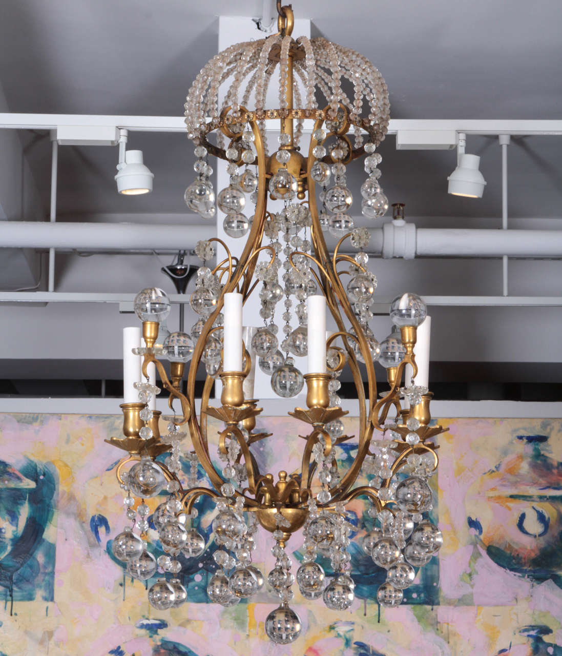 Fine quality bronze and crystal chandelier with 'bubble' crystals with a beaded crystal crown surrmount.
A rare example of 1940's high end French lighting.