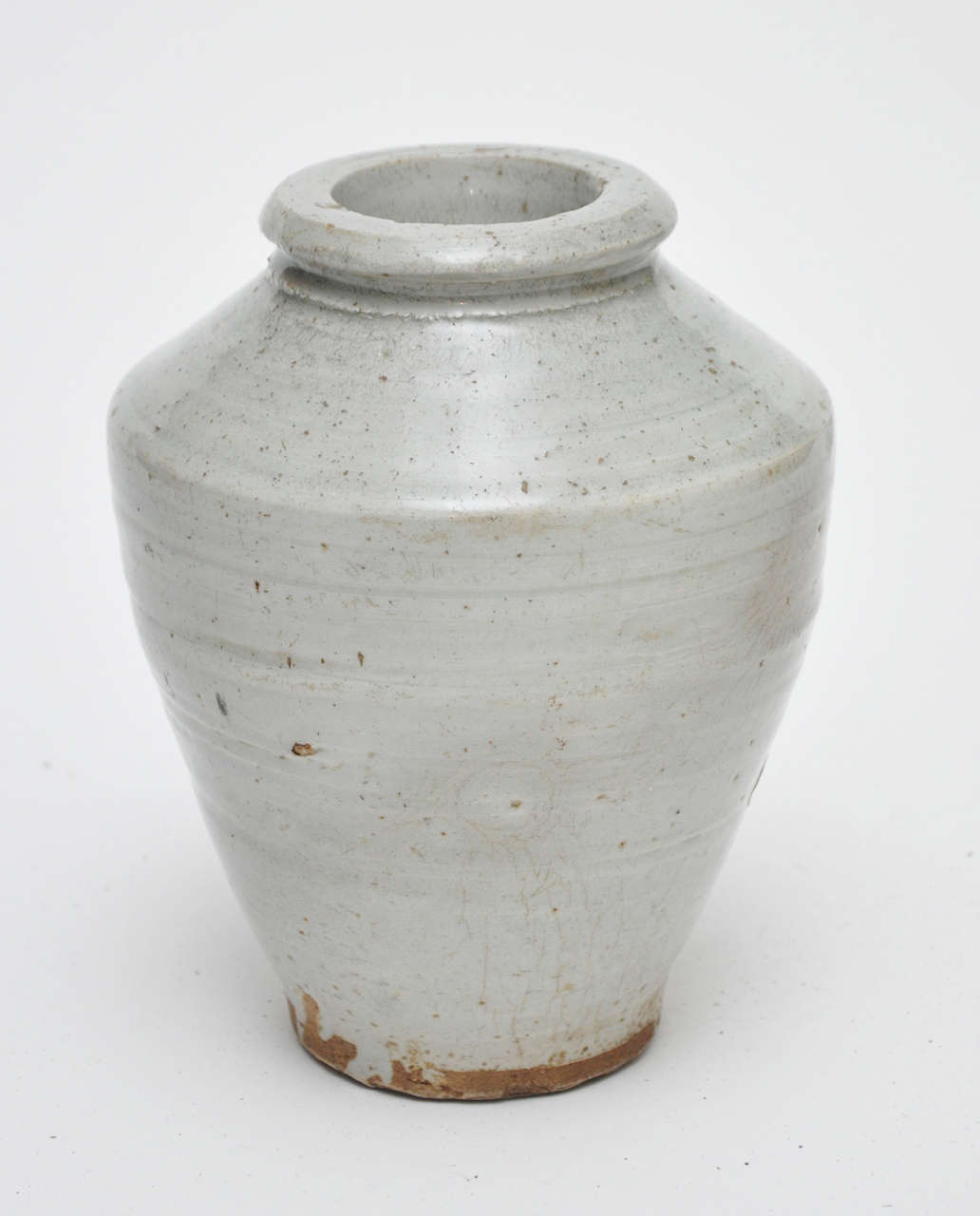 This is an extra large apothecary jar from the 12th century Yuan Dynasty done in a gray glaze.