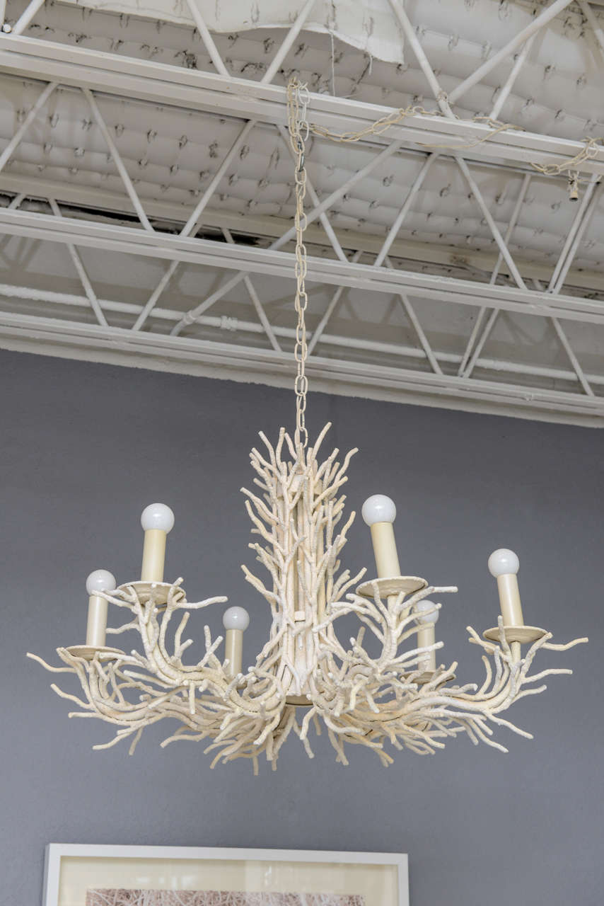 Impressive, heavily detailed, faux coral chandelier adds instant beach-side sophistication and whimsy.