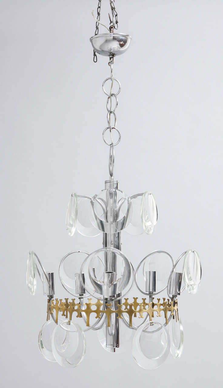 Beautiful 1960s Murano crystal pendant lamp by Vistosi with chrome and brass frame and faceted crystal disc glasses.