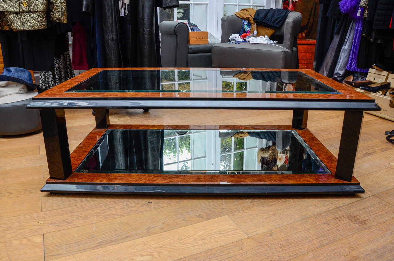 Rosewood and bird's eye maple coffee table with two beveled glass top.