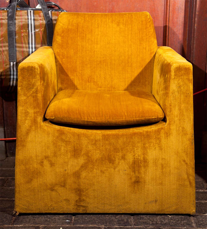 Gold velvet tapered, pyramid shaped upholstered chair on casters. Makes a great executive desk chair. Chic!