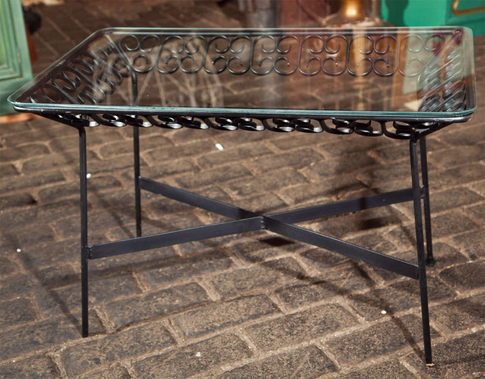Small wrought iron side table from the Grenada collection designed by Arthur Umanoff and manufactured by Boyuer Scott Company.