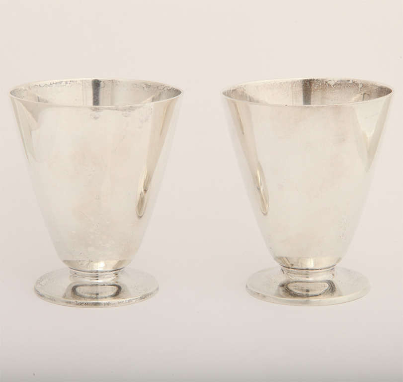 These pair of Sterling cordials have many hallmarks on the bottom,  besides the Tiffany hallmark. They have worn sterling silver on one of the cordials. They can also<br />
be used for many other purposes; like pen/pencil holders, and makeup