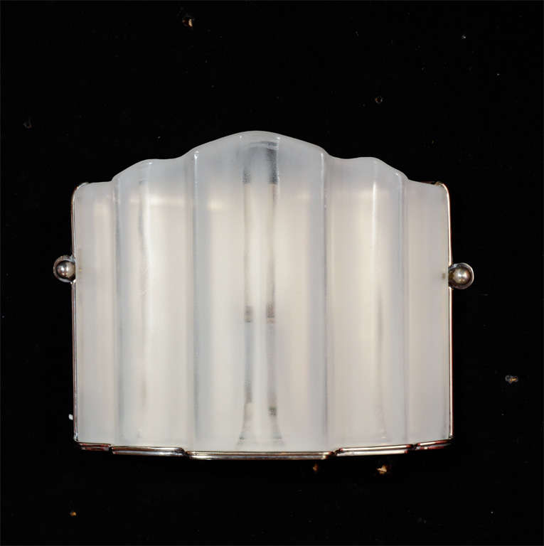 Art Deco molded glass sconces with nickle frames