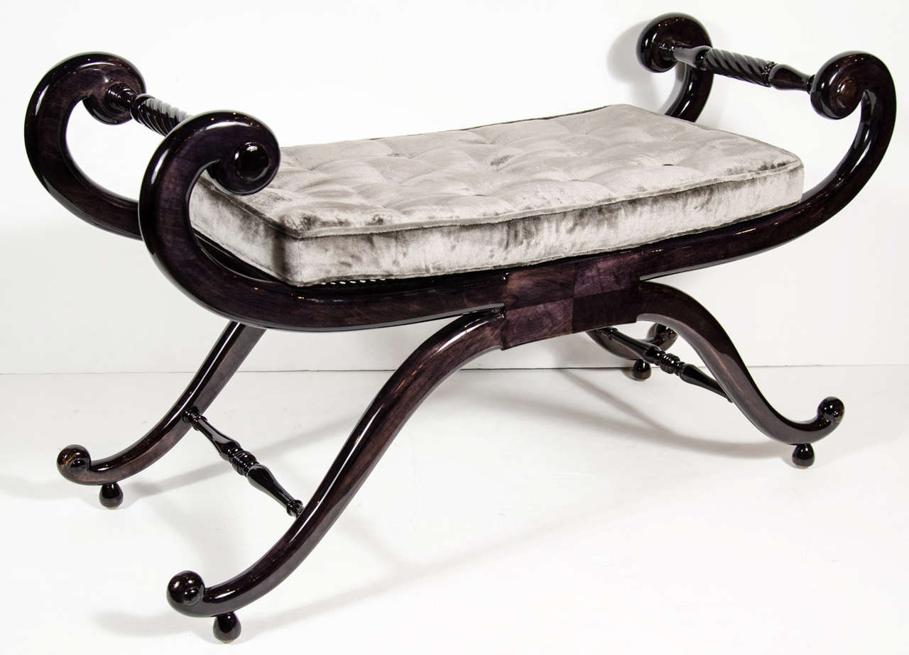 This elegant sleigh bench features a scroll design in ebonized walnut and newly upholstered in a gorgeous pewter velvet with button detailing.