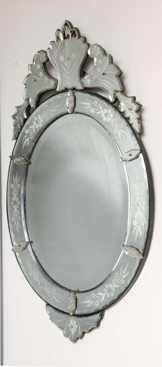 An Oval Venetian Mirror At 1stdibs An Oval Venetian Mirror The Center Beveled Glass Surrounded By Carved And Etched Mirrored Frame
