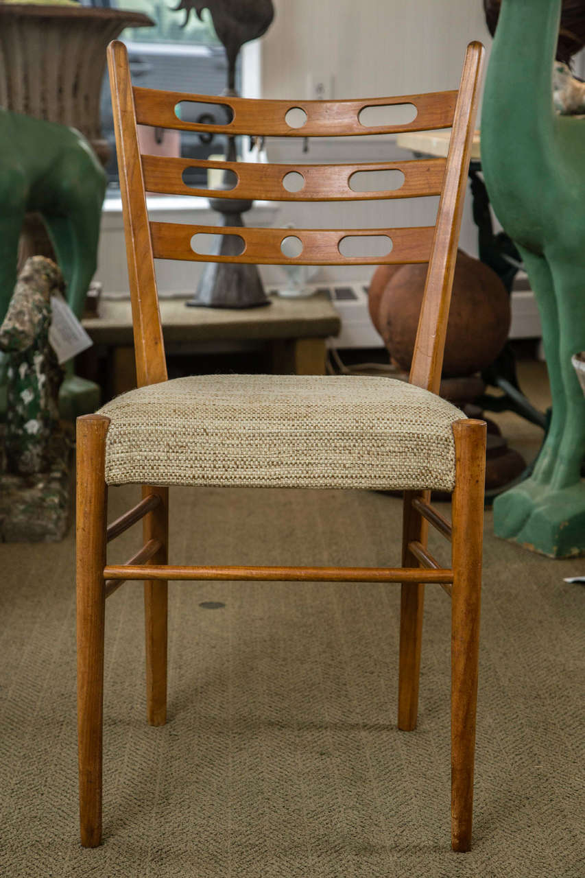 Set of four cherrywood chairs.