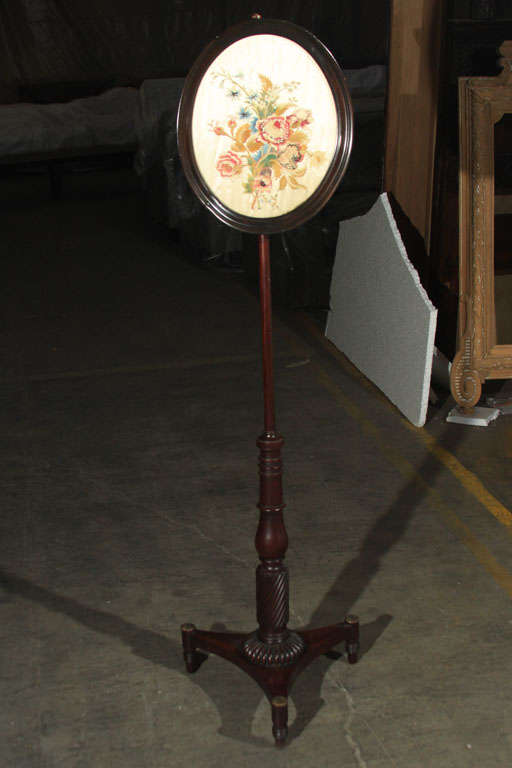 Early 19th century English Regency mahogany fire pole stand with magnificent original period needle work