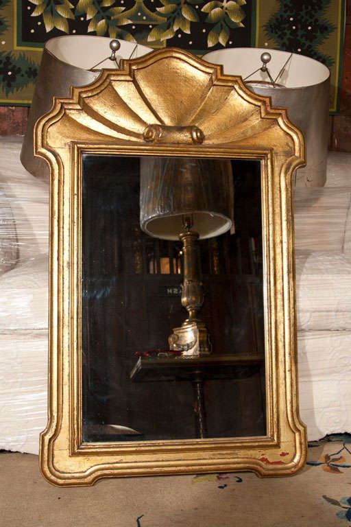 Gilt shell motif mirror attributed to Dorothy Draper.