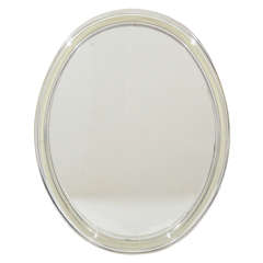 Hollywood Lucite Oval Mirror with Stylized Beveled Frame