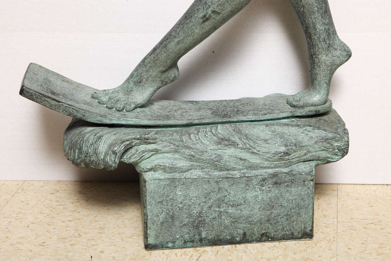 A patinated bronze figure of a nude water skiing In Good Condition In New York, NY