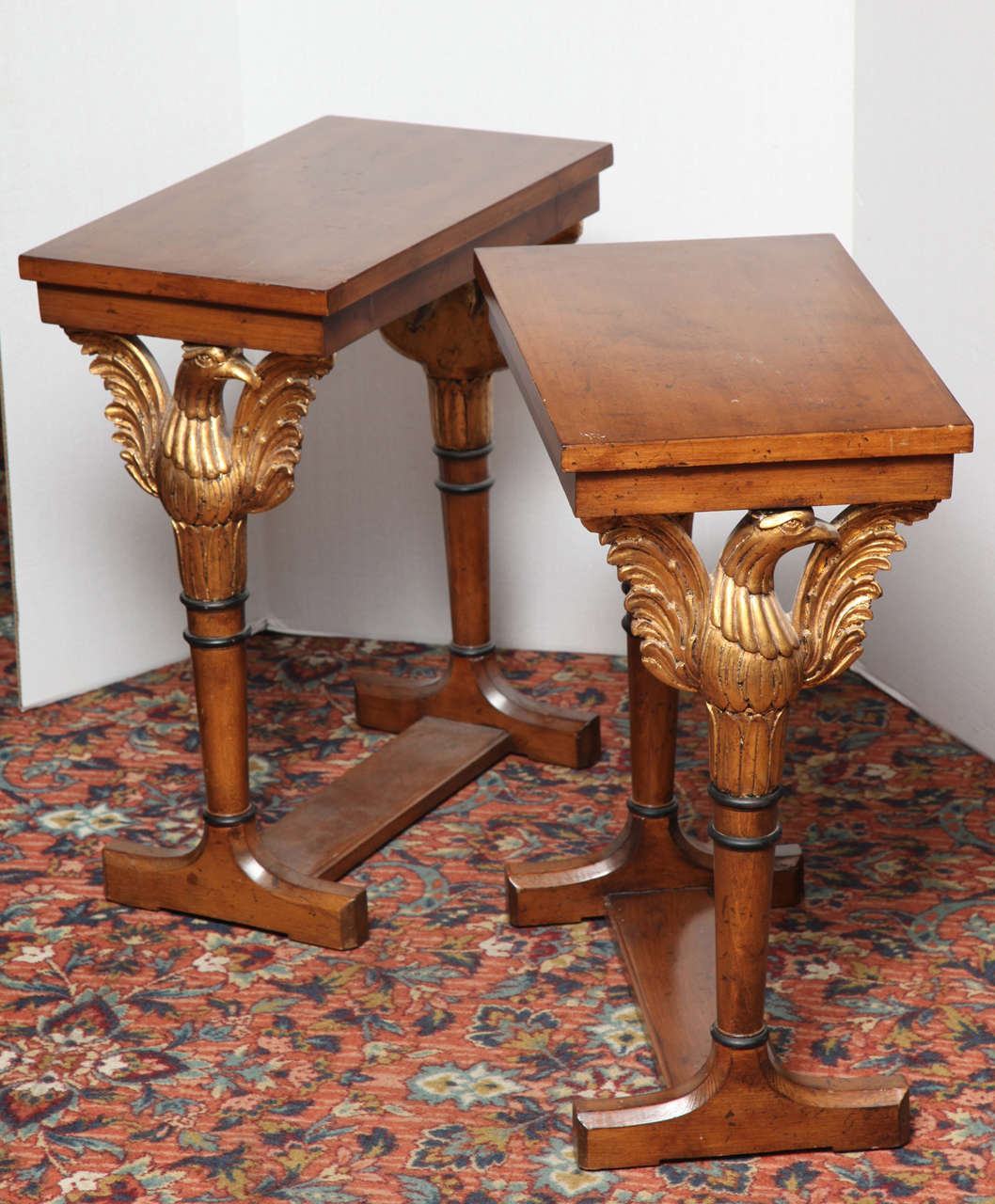 20th Century Pair of classical darkwood and giltwood side tables with eagles on side