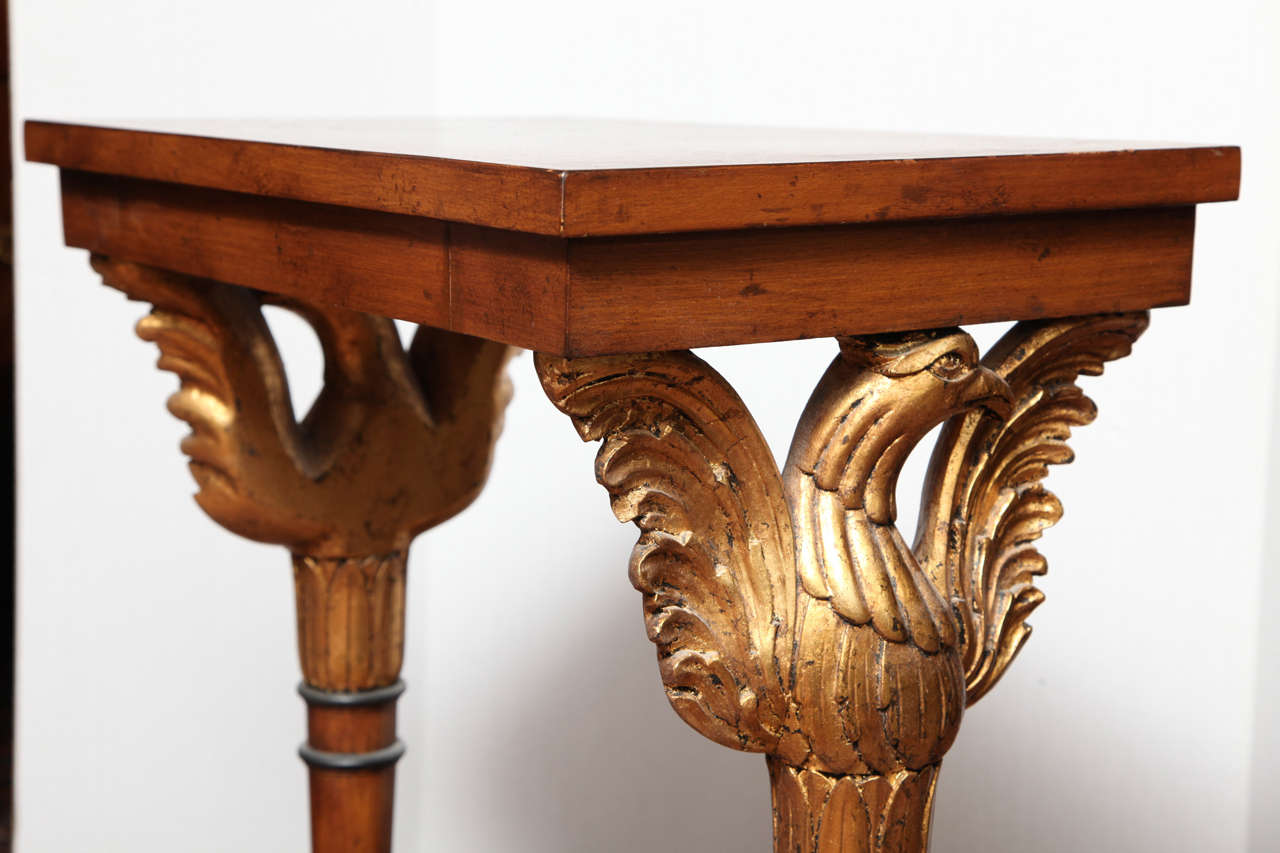 Pair of classical darkwood and giltwood side tables with eagles on side 2