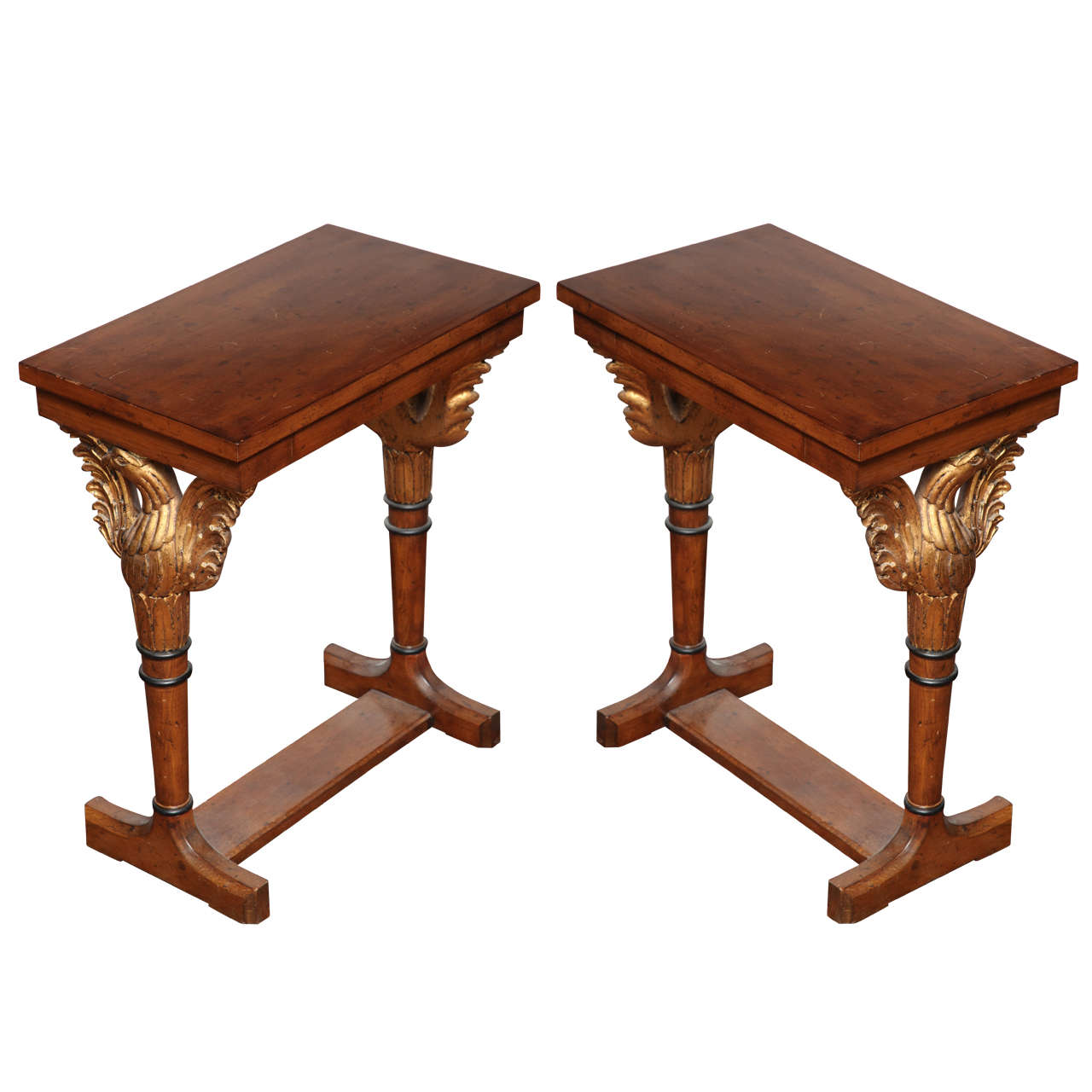 Pair of classical darkwood and giltwood side tables with eagles on side