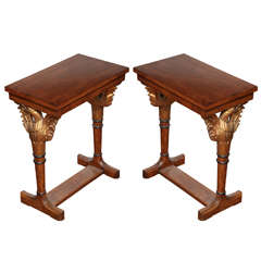 Pair of classical darkwood and giltwood side tables with eagles on side
