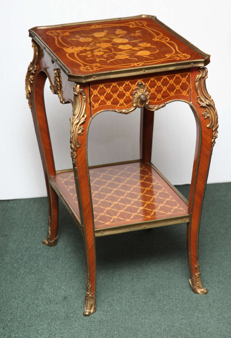 French Pair of two tier inlaid marquetry and parquetry side tables