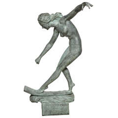 A patinated bronze figure of a nude water skiing at 1stDibs