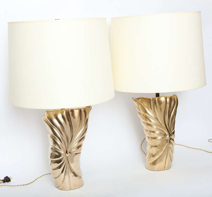 A pair of Mid Century Modern  patinated brass table lamps 
New sockets and rewired
Shades not included