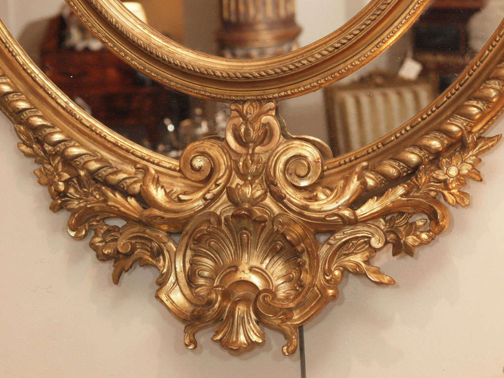 A Fine Pair of Antique Oval Carved Giltwood and Gesso Mirrors For Sale 3