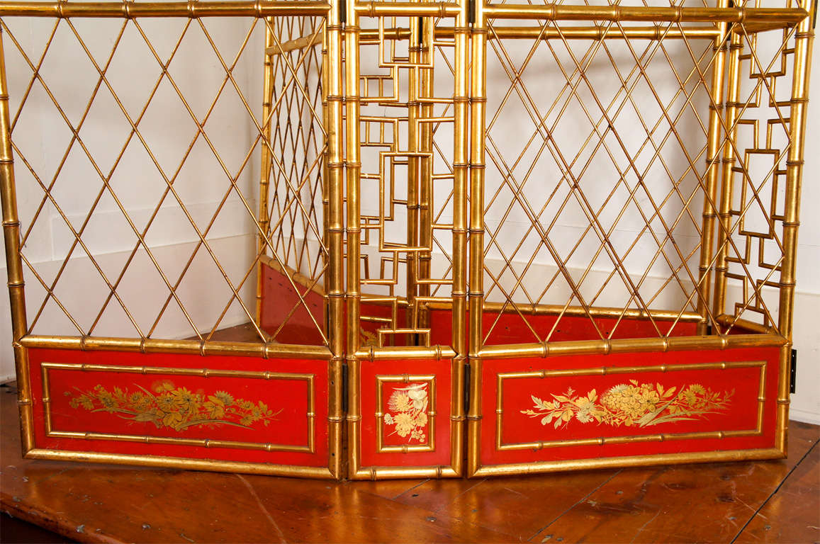 Nice 7 panel giltwood, gilt metal, and red lacquer open screen.