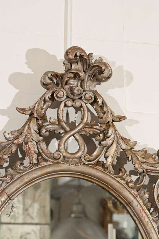 Carved A Rococo Style Silver Gilt Wall Mirror