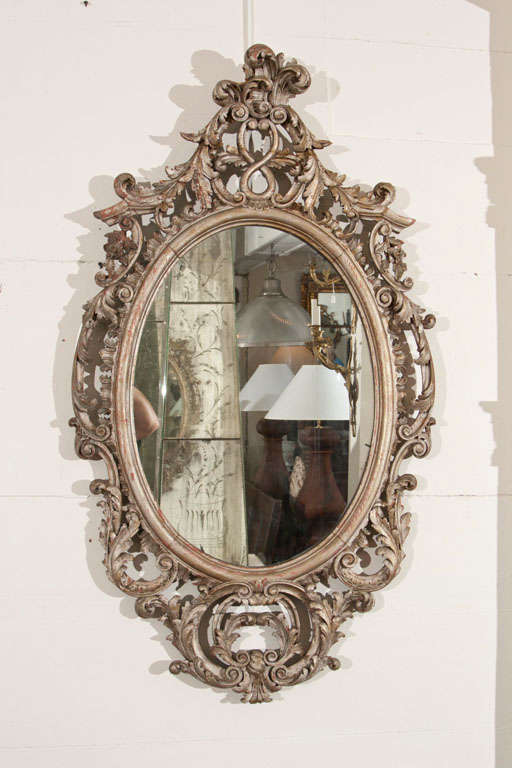 A Lively and Atmospheric Rococo Framed Mirror.
