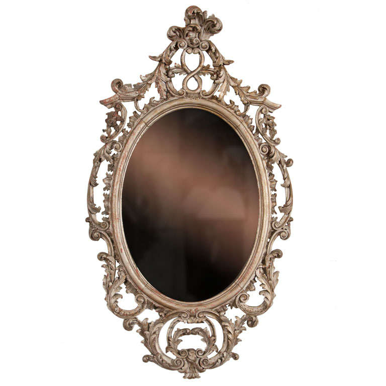 A Rococo Style Silver Gilt Wall Mirror