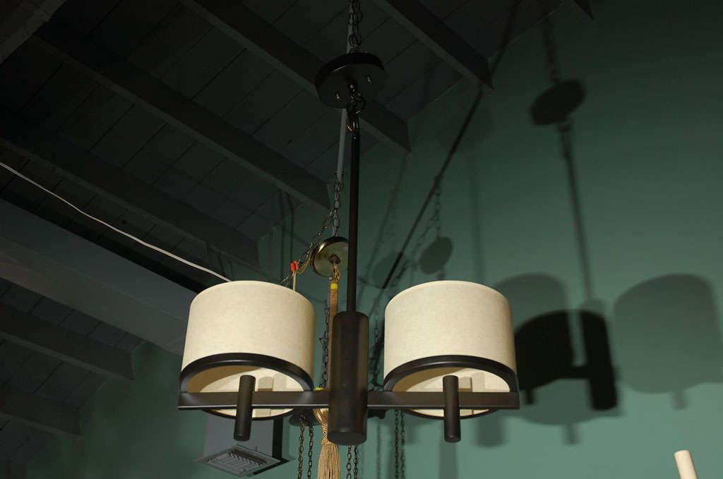 Paul Marra Design modern Two-Arm Silk Drum Pendant shown in Oil Rubbed Bronze with ivory silk pongee shades. 