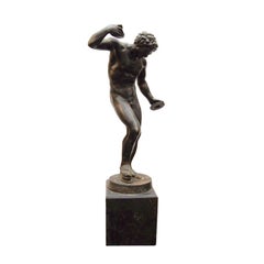 Bronze figure of Dancing Faun with musical instruments