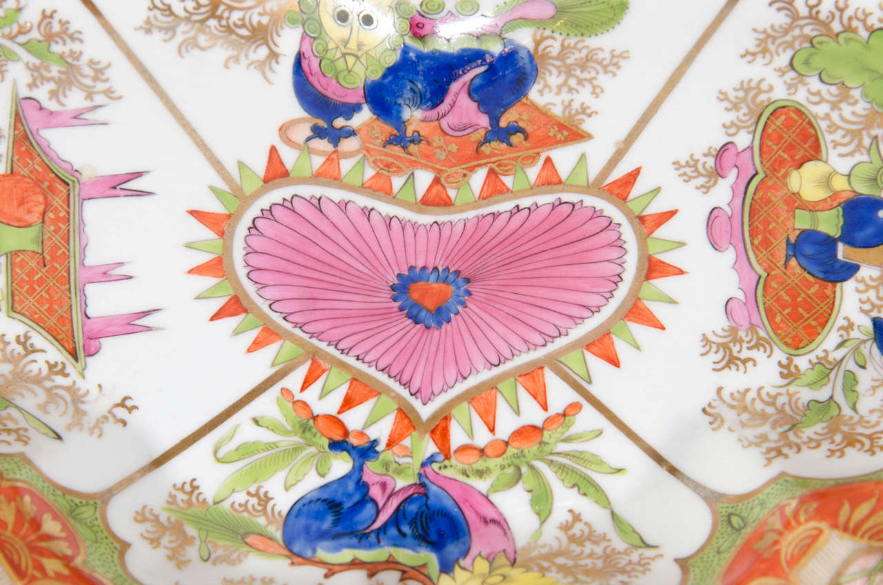 A Chamberlain's Worcester Bengal Tiger heart shaped dish painted with mythical beasts  within lappet-shaped panels. The central medallion represents a chrysanthemum, a Chinese symbol of autumn and long life. 
This popular Regency period pattern was