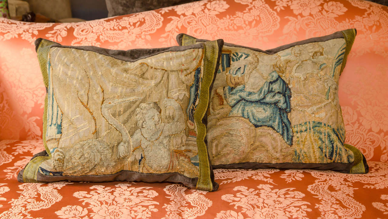 A pair of Flemish tapestry fragment made into pillows,
circa 1780.